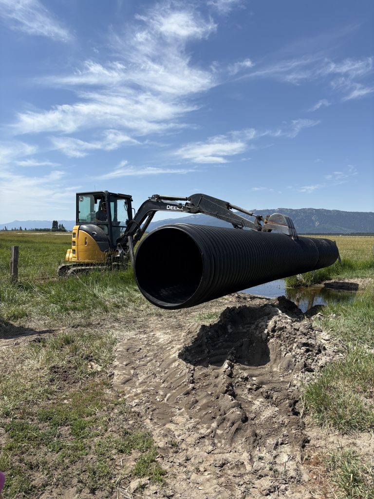 water sewer Caldwell - Tractor and Cleanup water sewer Caldwell main pipe replacement