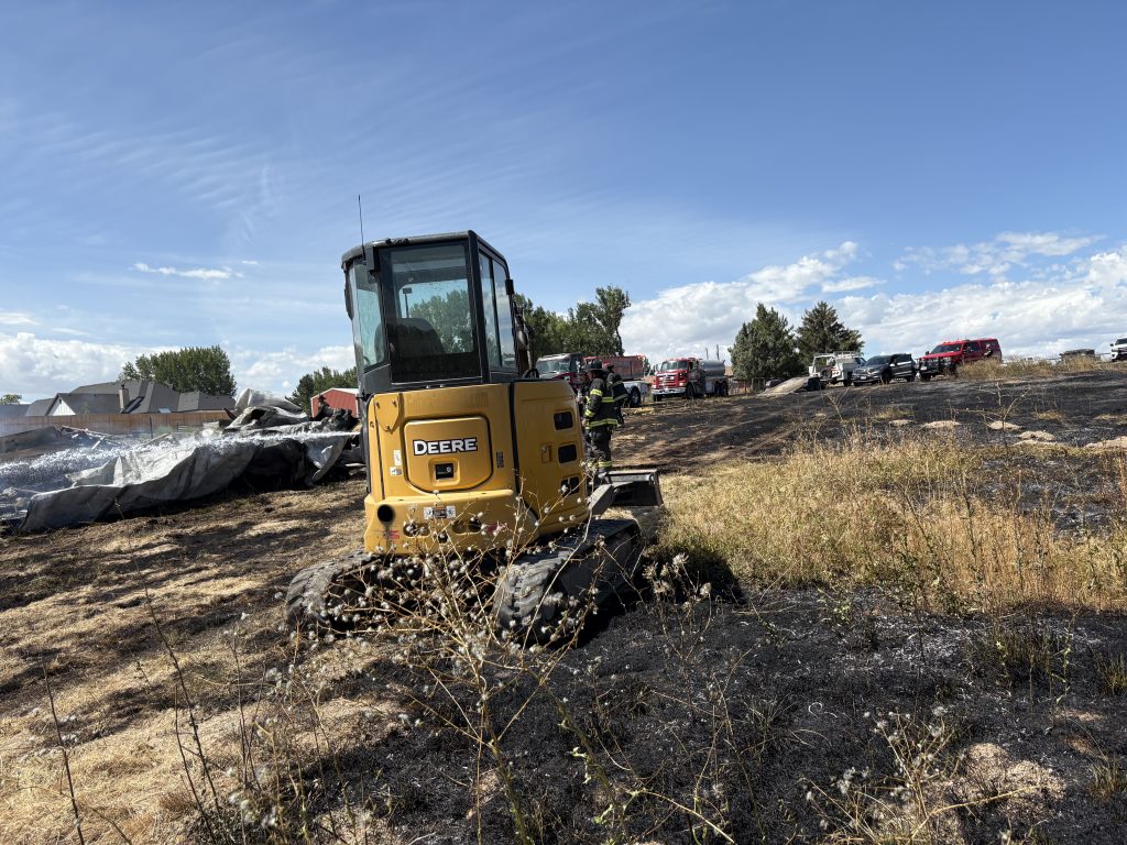 AssistingFiremen-2 - Tractor and Cleanup assisting firemen